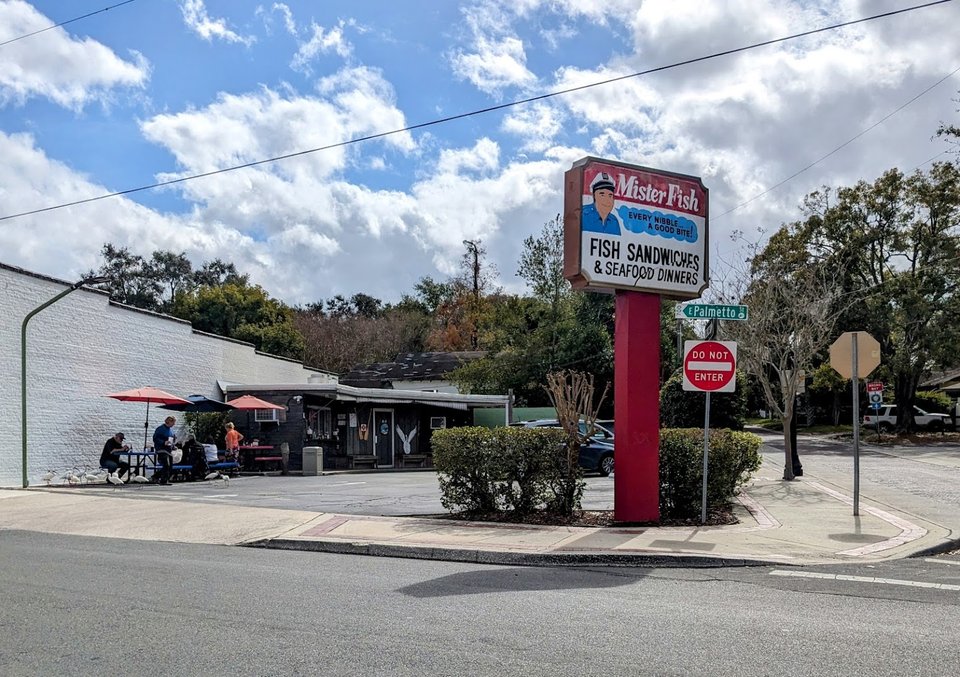 Seafood restaurant storefront on a city street.